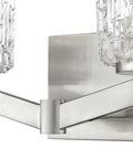Close-up of two light vanity fixture with crystal glass shades in chrome finish, showcasing modern luxe bath light design for transitional spaces.