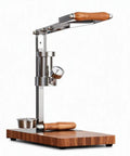 Portable Manual Espresso Maker With Adjustable Pressure Dial And 58 Mm Bottomless Portafilter Design showing textured walnut grip lever and hydraulic gauge.