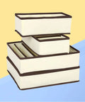 Four Piece Plastic Drawer Organizers With Six Seven Eight Compartments In Warm Beige for closet and office organization.