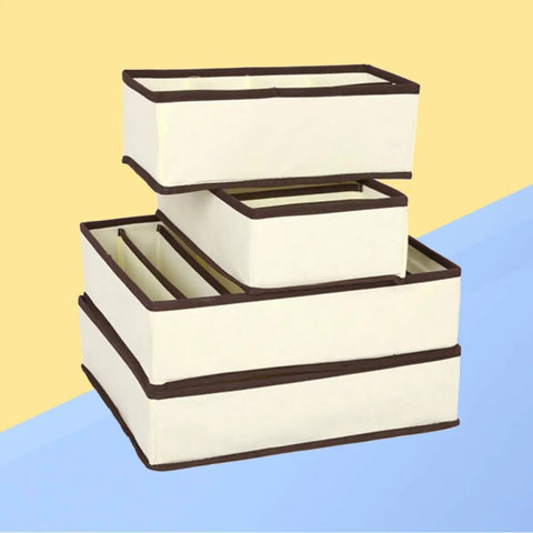 Four Piece Plastic Drawer Organizers With Six Seven Eight Compartments In Warm Beige for closet and office organization.