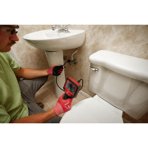 Person using MSpector 4 Foot Inspection Camera Borescope With 4.3 Inch LCD And 640x480 Video to inspect under a bathroom sink