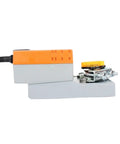 High Caliber Damper Actuator With AC DC 24 Volt Input And 8 Nm Torque, compact design for seamless shop airflow control.