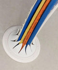 Construct Pro Speedy’Z Spring-Lock 2-inch Cable Pass-Through Port, white round wall plate with multiple cables.