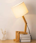 Cute Desk Lamp With Wood Base And Changeable Shape, Modern Table Lamp For Bedroom Study Office And Kids Room, Ivory Linen Lampshade, 18.8 Inches Tall, Cozy Vibe, Functional Home Accent Light on stack of books