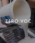 Ultra Clear Strippable Wallpaper Adhesive being poured into a tray, zero VOC, Pro 880 Formula, 32 ounce for 80 sq ft coverage