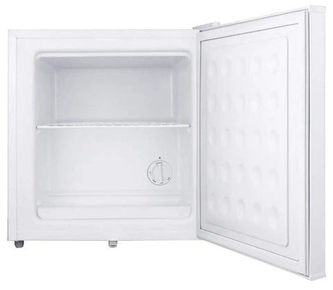 1.4 Cu Ft Compact All Freezer In Crisp White Offering No Fuss Manual Defrost And Relentless Subzero Chill To Keep Your Goods Locked Up Cold Perfect Low Key Setup For Small Kitchens And Apartments, open door view with single shelf.