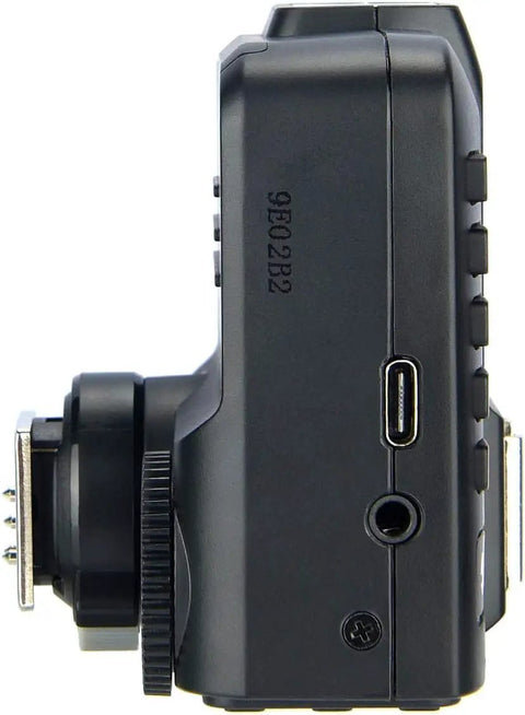 Side view of Canon TTL Wireless Flash Trigger with Bluetooth App Control, showing USB-C port and locking hotshoe for off-camera shooting.
