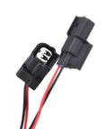 Close-up of VCM Muzzler Harness Disable Kit With Plugs For 3.5L V6 Honda Engines Including Ridgeline Odyssey Pilot Accord And Acura Vehicles To Disable Cylinder Deactivation For Improved Power Throttle Response And Engine Sound showing connectors.