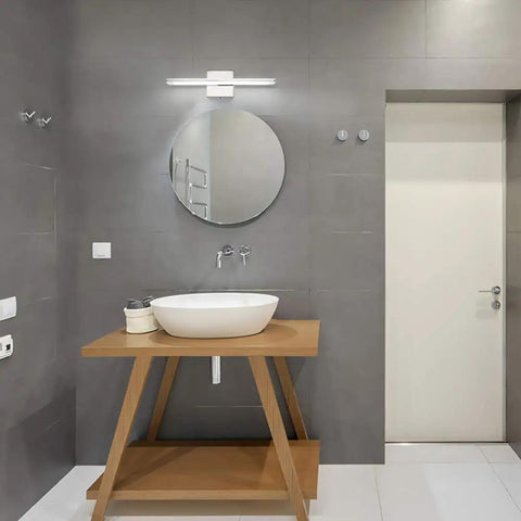 Lit Modern LED Vanity Light Bar For Bathroom, 16 Inch Chrome Mirror Light Fixture above round mirror and wooden sink stand