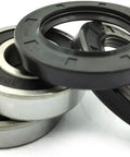 Fix Your Rig Washer Tub Bearing And Seal Kit parts displayed with metal and rubber materials for Whirlpool Maytag washers.