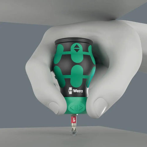 Close-up of hand holding a Compact Stubby Magazine RA 1 Tool Organizer for Short Screwdrivers and Bit Holders