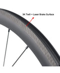 3K twill laser brake surface on 38mm aero rim of Dope 700C carbon clincher wheelset, highlighting material and design.
