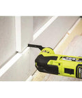 Cutting wood trim with 16 Piece Oscillating Tool Blade Accessory Set With Universal Fitment For Quick Cuts 35 Percent Faster Cutting