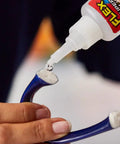 Applying Crystal Clear Super Glue Instant Bond Adhesive Hella Tough 20 Gram Bottle With Precision Tip Applicator for quick repair.