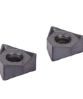 Two square black-coated carbide turning inserts with central hole, angled view