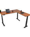 Level Up Your Remote Setup With This Hella Reliable Triple Motor Electric L Shaped Corner Standing Desk featuring solid teak top and black steel frame.