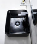 Top view of Matte Black Vessel Sink With Faucet And Drain Combo For Bathroom, 19 By 15 Inches Rectangular Above Counter Ceramic Art Basin.