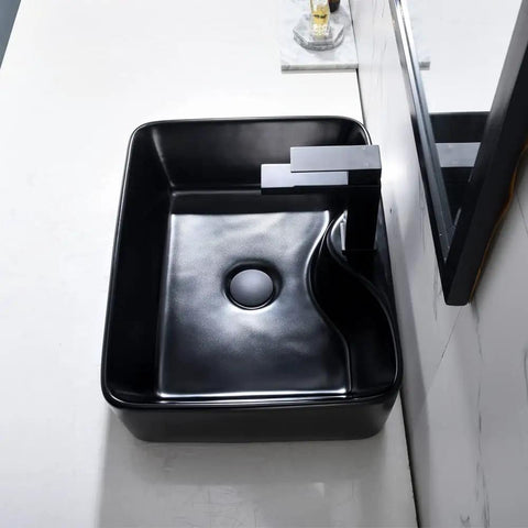 Top view of Matte Black Vessel Sink With Faucet And Drain Combo For Bathroom, 19 By 15 Inches Rectangular Above Counter Ceramic Art Basin.