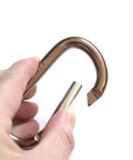 Close-up of copper trigger snap hook for Gel Padding Tool Belt Suspenders With Breathable Gel Shoulder Pad For Electricians, Construction Pros.