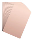 Stack of 12 copper-colored 4x6 inch double sided copper clad laminate PCB boards, 0.8mm FR4 for DIY electronics projects.