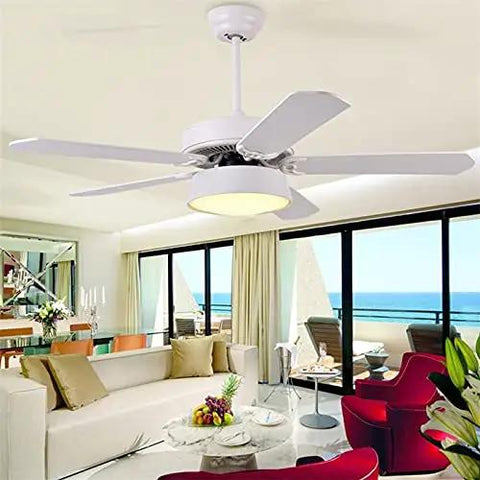 Modern Ceiling Fan With Led Light Kit And NoFuss Remote Control Bringing Smooth Airflow And Three QuickToggle Light Modes Perfect For Bedroom Living Space Or Kitchen Decor With Solid Wood Blades in white, installed in a bright living room.