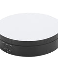 Upgrade Your Game With This Sick Electric Rotating Display Stand Boasting 3 Speeds And 4 Adjustable Angles For Showcasing Jewelry Watches And Cosmetics Like A Boss On A Sleek Black Mirror Surface Turntable Base featuring a round black base with a mirror top.