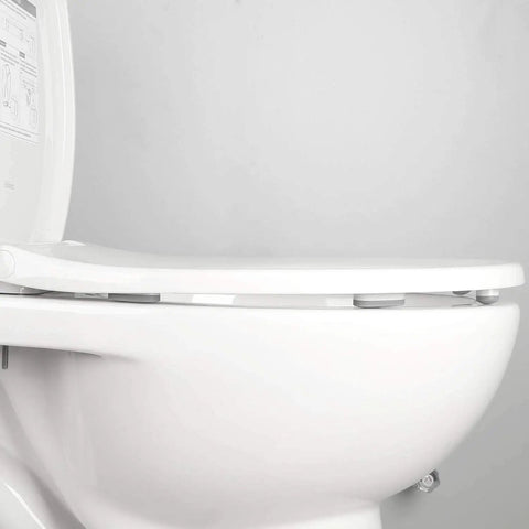 Side view of toilet with Universal Toilet Seat Bumpers With Dual Height TPE Pads 10 Pack Adhesive Rubber Bidet Seat Cushions for quiet protection.