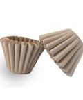 Sturdy 1 To 4 Cup Coffee Basket Filters Biodegradable Unbleached Natural Brown Paper For Easy Home Office Brew Keeps Grounds Out Fits Most Coffee Makers 50 Count displayed with one standing and one lying flat.