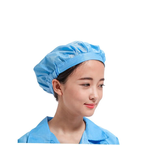 Heavy Duty 12 Pack Breathable Antistatic Mesh Work Caps For Adults And Super Comfy Dustproof Polyester Shop Hats With Quick Dry Panels. Woman wearing a blue mesh work cap.