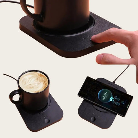 Solidly Built Wireless Charging Mug Warmer And Desk Phone Base With Auto Shut Off Keeps Your Morning Brew Piping Hot While You Charge On The Fly In Classic Black with coffee and smartphone.