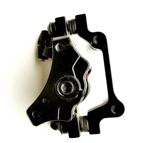 Top view of Hardcore Mountain Mechanical Disc Brake Kit caliper, black with red accents, designed for reliable trail stopping power.