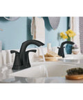 Slick Matte Black Hi Arc Kitchen Faucet With Single Handle High Arc Spout Ceramic Disc Valve in bathroom setting