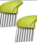 Two green-handled stainless steel crinkle cutters with wavy blades for vegetables.