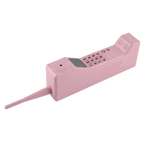 Kickass Vintage Cellphone Prop Cast From Heavy Duty Iron Serving Major Eighties Brick Phone Throwback Aesthetic Optimal For Film Productions Social Media Shoots And Cool Room Accents, pink retro iron mobile handset with antenna.
