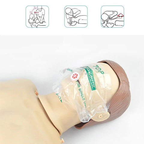 CPR mask shield, 50-pack; clear disposable barrier with one-way valve installed on a mannequin head