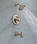 Slick Stainless Tub And Shower Trim Kit With Single Handle Faucet, 5 Spray Touch Clean Shower Head, Model T14438-SS shown in use