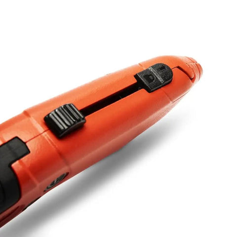 Close-up of Auto Retracting Safety Utility Knife with red thumb bridge grip and quick-change blade mechanism