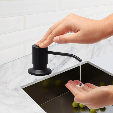 Person using Matte Black Kitchen Sink Soap Dispenser With 47 Inch Extension Tube Kit and 17 Oz Soap Bottle, hands-free pump action
