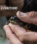 Hands using LineDriver Fishing Multitool 6 In 1 Line Vise Hook Threader Scissors Split Shot Crimper Eyelet Clearing Spike