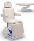 Professional Fully Electric Facial Massage Table With Lift For Estheticians, padded cream chair with motorized lift features.