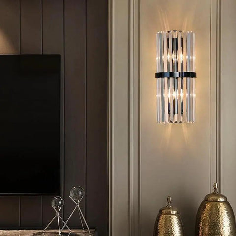 Top Shelf Crystal Wall Sconces With Brushed Black Metal And Sleek Bedroom Vanity Light For Bathroom Fixture Modern Bedside Lamp For Dining Room Decor Heavy Duty Build With Fresh Vibes mounted beside a TV in a stylish room.