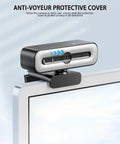 Premium 4K Webcam With Built In Ring Light And Dope Privacy Shutters For Crisp Streaming And Badass Video Calls Featuring Dual AI Noise Canceling Mics Plus Super Fast Autofocus with anti-voyeur protective cover on monitor.