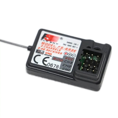 Close-up of FS GR3E receiver for Three Channel Two Four GHz RC Transmitter With FS GR3E Receiver For Cars Boats Trucks And Crawlers