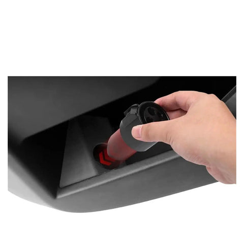 Hand inserting charging adapter into Superior Charging Adapter Storage Box For Tesla Cybertruck Cable Hanger Dock Rock Solid Center Console Organizer Straight Up Custom Fit Holder For 2024 And 2025 Ride Gear.