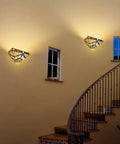 Vintage Tiffany Style Stained Glass Wall Sconce 2 Light 12 Inch Wide Cream Amber in elegant staircase setting