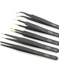 Close-up of precision tweezers from Dope 28 Piece Model Tools Kit For Gundam And Car Model Building, Easy Start Hobby Craft Set.