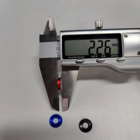 Digital caliper measuring M4 aluminum washer, part of 60Pcs M4 Counterbore Washers Anodized Aluminum Alloy Black For RC FPV Drones PCs