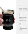 Level Up Your Daily Sip Routine With This Sleek Double Wall Stainless Steel Yerba Mate Cup Set Featuring Two Reliable Bombillas And A Hassle Free Cleaning Brush, black stainless steel yerba mate cup held in hand.