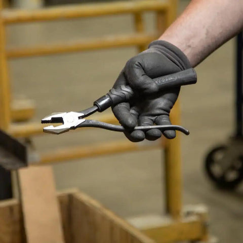 Hand holding pliers with Plier Cushion Grip Kit With Heat Shrink Bands For Slim-Head Ironworker Pliers 201-7CST 2-Pack Made In USA