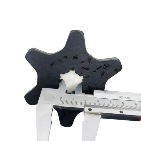 Clutch Cam Helix And Transmission Compression Spring Kit part measured with calipers, showing size for outer assembly replacement